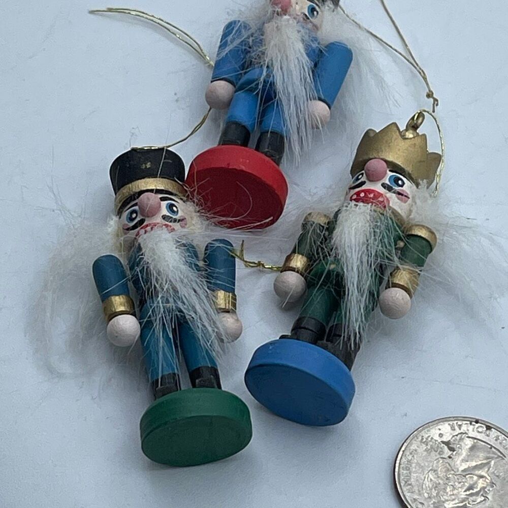 Lot of 3 vintage 2.5” wooden nut cracker ornaments